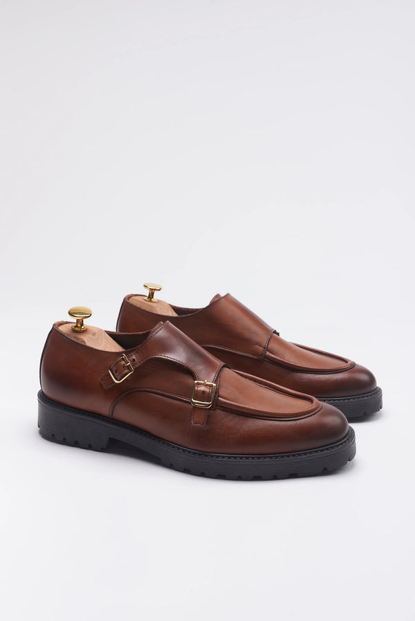 Double buckle moccasin with leather sole